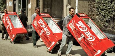 Coca-Cola's biggest challenge in greening its operations is its own global marketing strategy