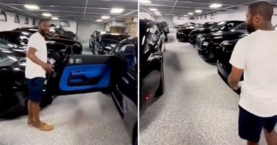 Boxing legend Floyd Mayweather shows off all-black collection of 17 supercars