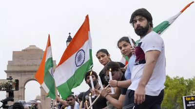 Protesting wrestlers hold candlelight march demanding arrest of Brij Bhushan