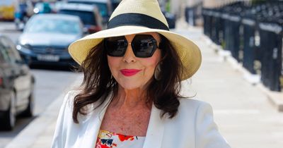 Joan Collins stuns on 90th birthday as she poses for snaps in return to signature style