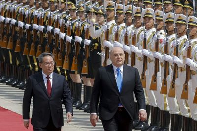 China's premier hails close ties in talks with Russian PM