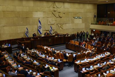Clearing Israel budget, Netanyahu hints at resumption of judicial overhaul