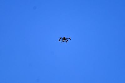 Man charged with flying drone above ground which saw football match halted