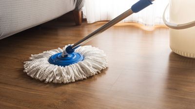 How professional cleaners mop hardwood floors – to prevent warping and discoloration