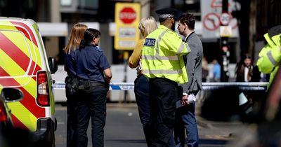 Man injured in early morning attack as police cordon off road in Chinatown with forensics at scene