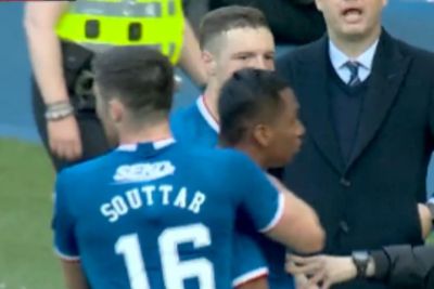 Moment Morelos is hauled back from Hearts bench after Rangers goal celebration