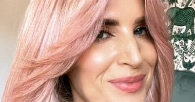 Sarah-Jayne Dunn shows new pink hair as she goes for important health screening