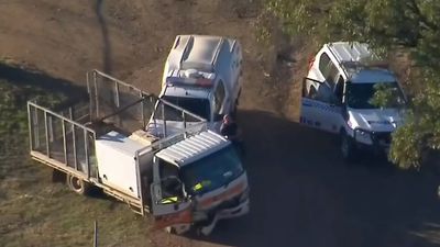 Man charged with attempted murder after allegedly ramming police in stolen truck near Toowoomba