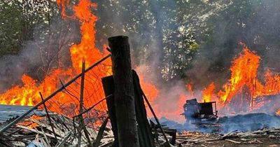 100 tonnes of timber set on fire in huge blaze sending black smoke hovering over Ely again