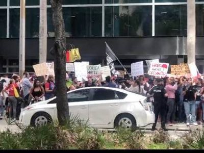 Anti-DeSantis protesters demonstrate outside Miami hotel amid meeting of governor’s donors