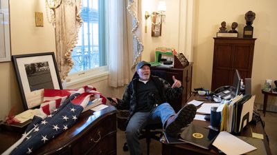 Capitol rioter who rested feet on desk in Pelosi's office sentenced to over 4 years in prison