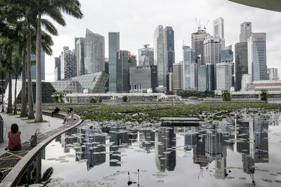 Singapore economy beats estimates as government warns of risks