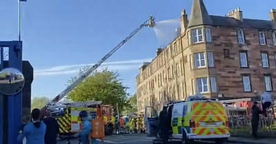 Two people rushed to Edinburgh hospital after fire tears through building