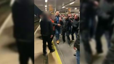 North London derby fan punched on to tracks as Arsenal and Tottenham fans clash at Finsbury Park station