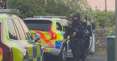 Edinburgh armed police lock down quiet street as helicopter deployed overhead