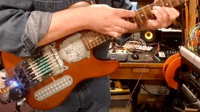 Guitarist creates a string-picking robot