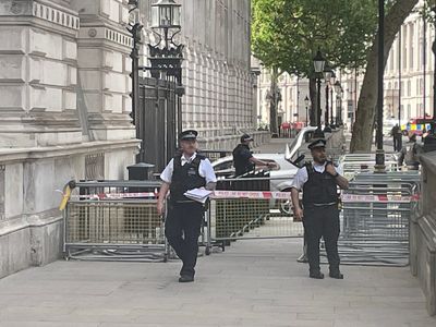 Downing Street gate crash – live: Whitehall in lockdown as man arrested by armed police