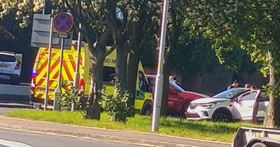 Driver removed from car and treated on roadside after crash