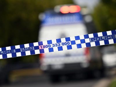 Man shot dead while sitting in car in suburban Sydney