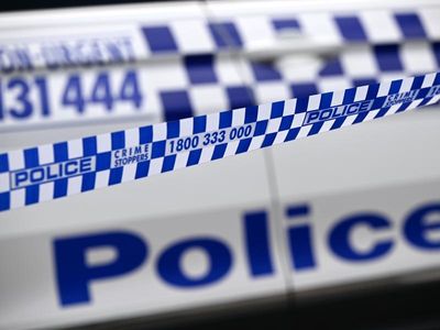 Police search for teenager over boy's stabbing death