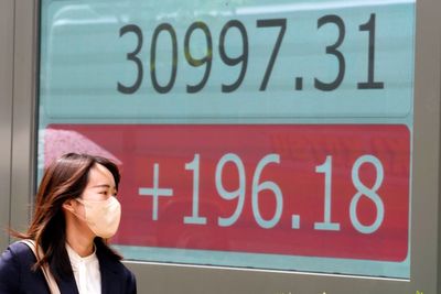 Stock market today: Asian markets mixed as US government debt talks push toward brink of default