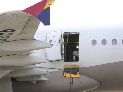 South Korea detains a passenger after a door opens on Asiana flight in mid-air