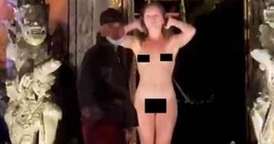 German tourist arrested after stripping naked and gatecrashing Bali temple show