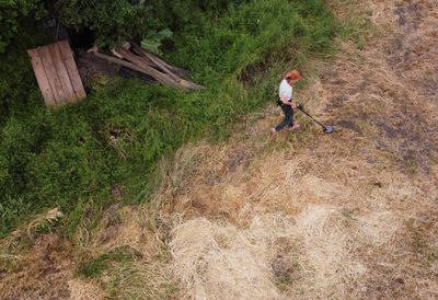 Ukraine war: pensioner sweeps fields for mines to put her cow out to pasture