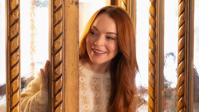 Pregnant Lindsay Lohan Is All In On The Black Swimwear Trend As She Shows Off Her Vacation Views