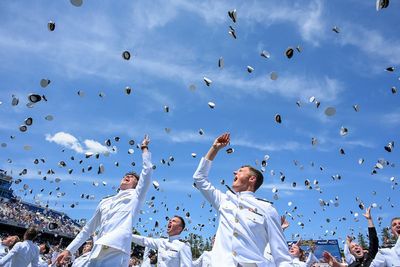 Defense secretary tells Navy graduates they are ready to serve