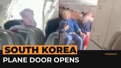 Man who opened Asiana plane’s door in flight was ‘uncomfortable’