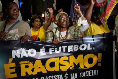 Disgusted by racism targeting soccer's Vinícius, his Brazilian hometown rallies to defend him