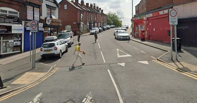 Armed police race to Leeds street as man, 22, stabbed in head, arms and hands