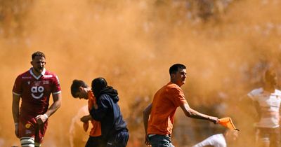 English Premiership final halted as protestors storm Twickenham pitch