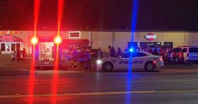 One dead and four injured after sports bar shooting - with gunman still on the loose