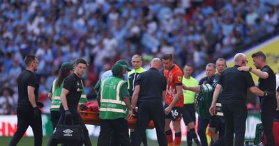Worrying scenes as Luton captain Tom Lockyer collapses during play-off final as parents rush from stands