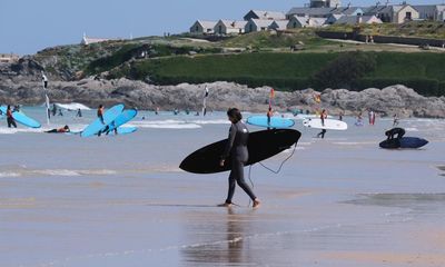 At least three people drown over bank holiday weekend as UK sees hottest day