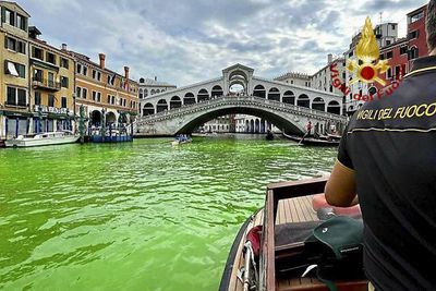 Authorities try to determine why Venice canal turned green