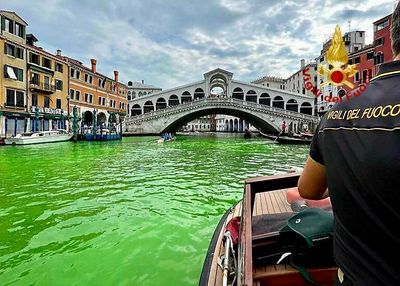 Venice police probe bright green liquid in Grand Canal