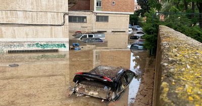 Spain travel warning as flash flooding turns streets into rivers in popular holiday spots