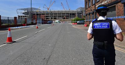 Police remain at scene after man found unconscious in street