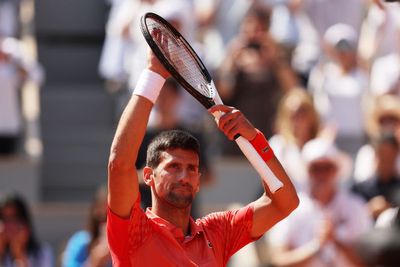 Novak Djokovic starts bid for 23rd Grand Slam title with straight sets win at French Open