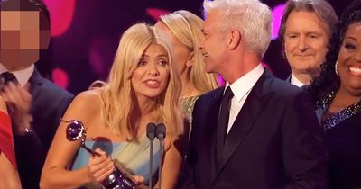 Phillip Schofield and lover spotted on NTAs stage as they 'share a look' during win