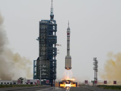 China launches a new crew into space, including its first civilian astronaut