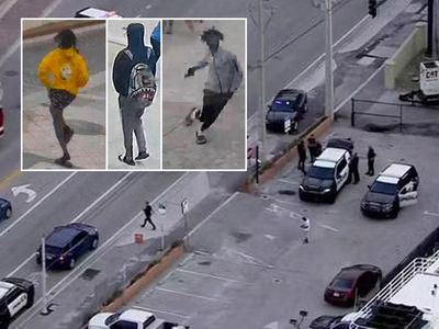 Hollywood beach shooting – live: Photos show suspects on the run after nine shot on Florida boardwalk