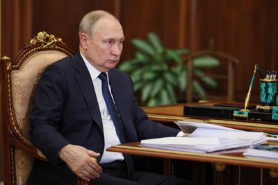 Putin working in Kremlin, has been briefed on drone attacks - spokesman