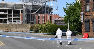 Arrest after man in his 50s found unconscious in street