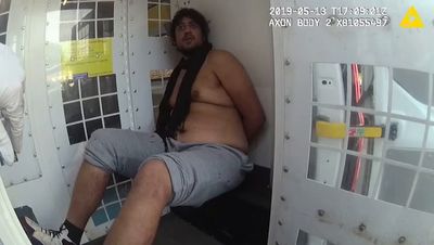 Handcuffed murder suspect ‘issued death threat on police body cam’