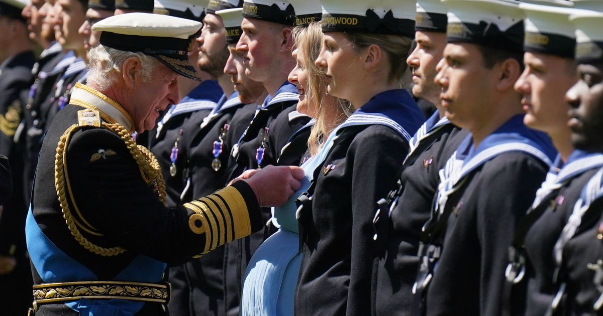 King Charles honours Navy staff including pregnant…