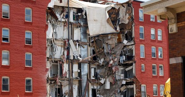 Five people missing in horror six-storey Iowa apartment collapse with two still in wreckage